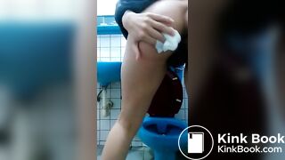 Asian girl squatting toilet poo and wipe