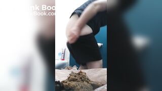 Girl shits a messy pile on the toilet lid