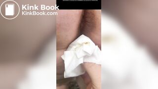 Wipes his ass