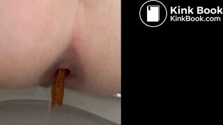 Sexy girl pissing and pooping on toilet