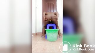 Ebony bucket shitter