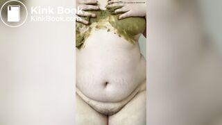 SSBBW smears her green shit on her big belly and tits