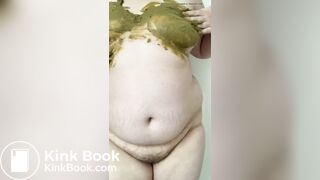 SSBBW smears her green shit on her big belly and tits