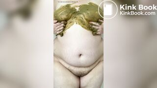 SSBBW smears her green shit on her big belly and tits