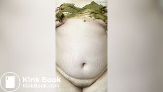 SSBBW smears her green shit on her big belly and tits