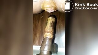 She fucks herself with a dildo and shits