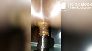 She fucks herself with a dildo and shits
