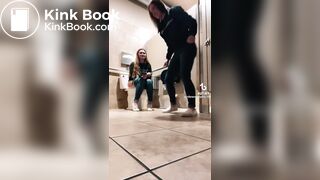Blonde girl pooping while accompanied by friend