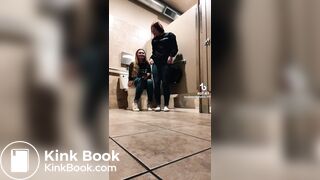 Blonde girl pooping while accompanied by friend