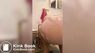 Diaper girl pushes out a big mess and pisses
