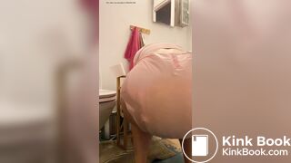 Diaper girl pushes out a big mess and pisses
