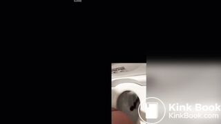 Japanese girl in pjs shitting on the toilet