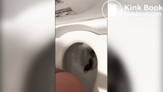 Japanese girl in pjs shitting on the toilet