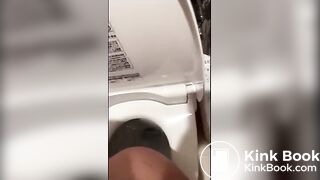 Japanese girl in pjs shitting on the toilet