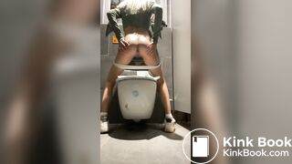 Pooping girl at the toilet