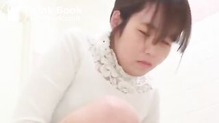 Asian girl getting excited doing a big poo