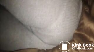 Woman fills pajamas in bed.