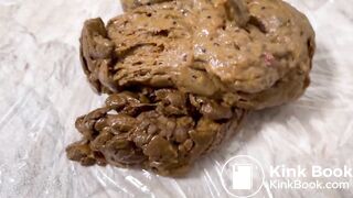 Blonde with nice ass takes a big dump on knees.