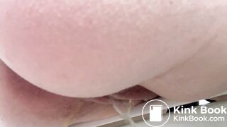 Blonde with nice ass takes a big dump on knees.