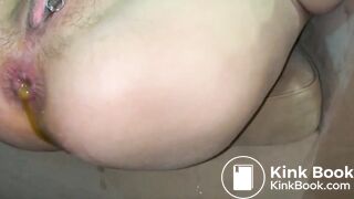 Chinese slave drinking own enema