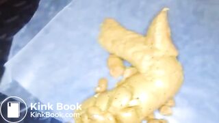 Yellow poo with seeds..