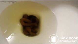 Pretty brunette pooping