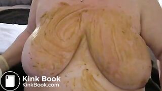 Smearing poo on huge tits..