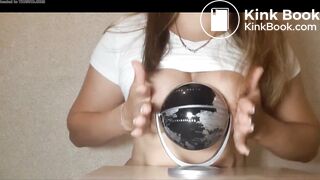 Girl shits on a globe