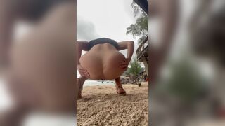 Hot blonde pooping on the beach