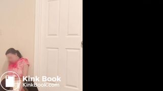 Cute girl poops diaper in front of door