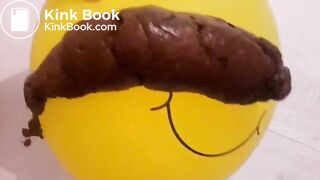 Girl shitting on balloon