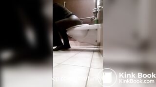 Ebony girl pooping and farting on public toilet - video 2
