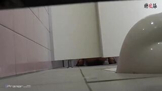 PEEPING AT CHINESE GIRLS USING THE RESTROOM.video-061