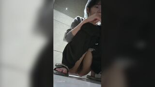 Peeping at Chinese girls using the restroom.ZAA_025