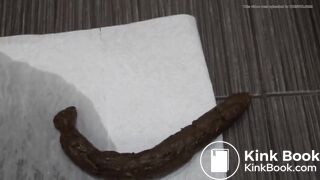 girl pushes out long turd