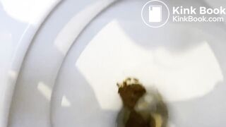 Tasting her shit in a public toilet