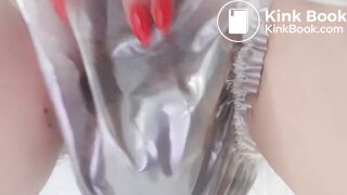 Big plastic pants poop under blue dress