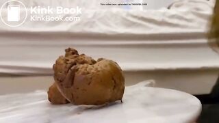 Hot brown hair girl whit big ass shitting a creamy pile