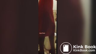 Girl in a red dress pissing at a party