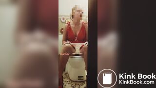 Girl in a red dress pissing at a party