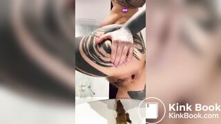 Hot tattooed ass girl shitting a big turd