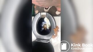 Woman shits in portable toilet