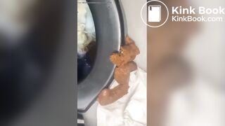 Woman shits in portable toilet