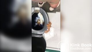 Woman shits in portable toilet