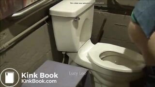 Redhead girl uses toilet