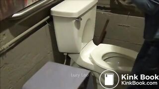 Redhead girl uses toilet