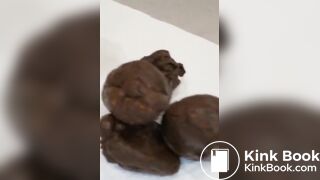 Pink haired teen pushes out big turd