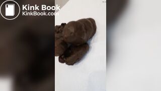 Pink haired teen pushes out big turd