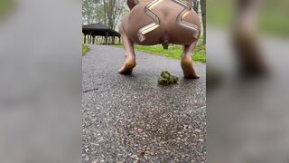 Girl shits in park on path