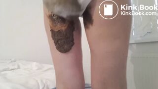 Big poop in thin white panties on bed